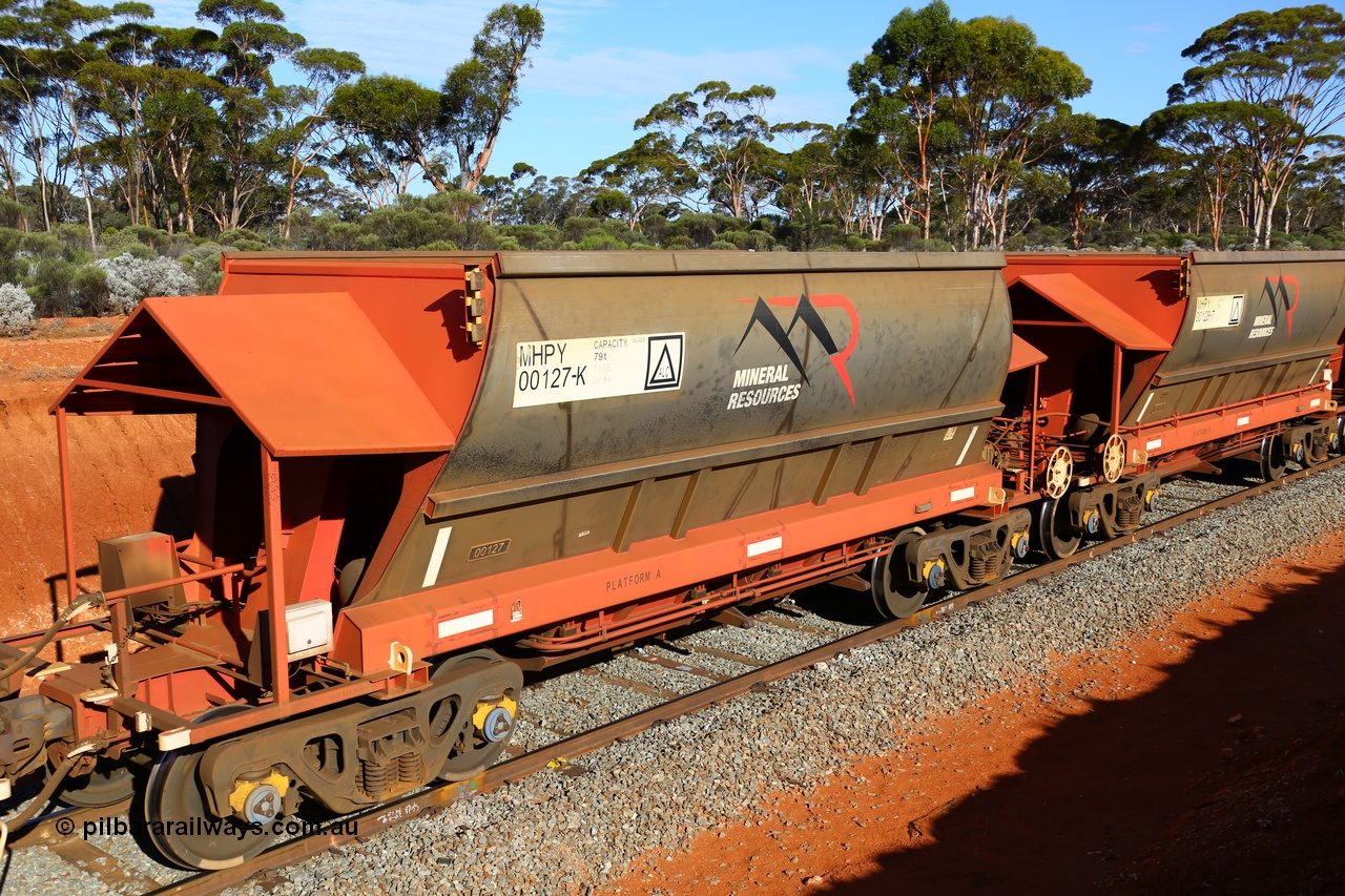 190109 1621
Binduli, Mineral Resources Ltd empty iron ore train 4030 with MRL's MHPY type iron ore waggon MHPY 00127 built by CSR Yangtze Co China serial 2014/382-127 in 2014 as a batch of 382 units, these bottom discharge hopper waggons are operated in 'married' pairs.
Keywords: MHPY-type;MHPY00127;2014/382-127;CSR-Yangtze-Co-China;