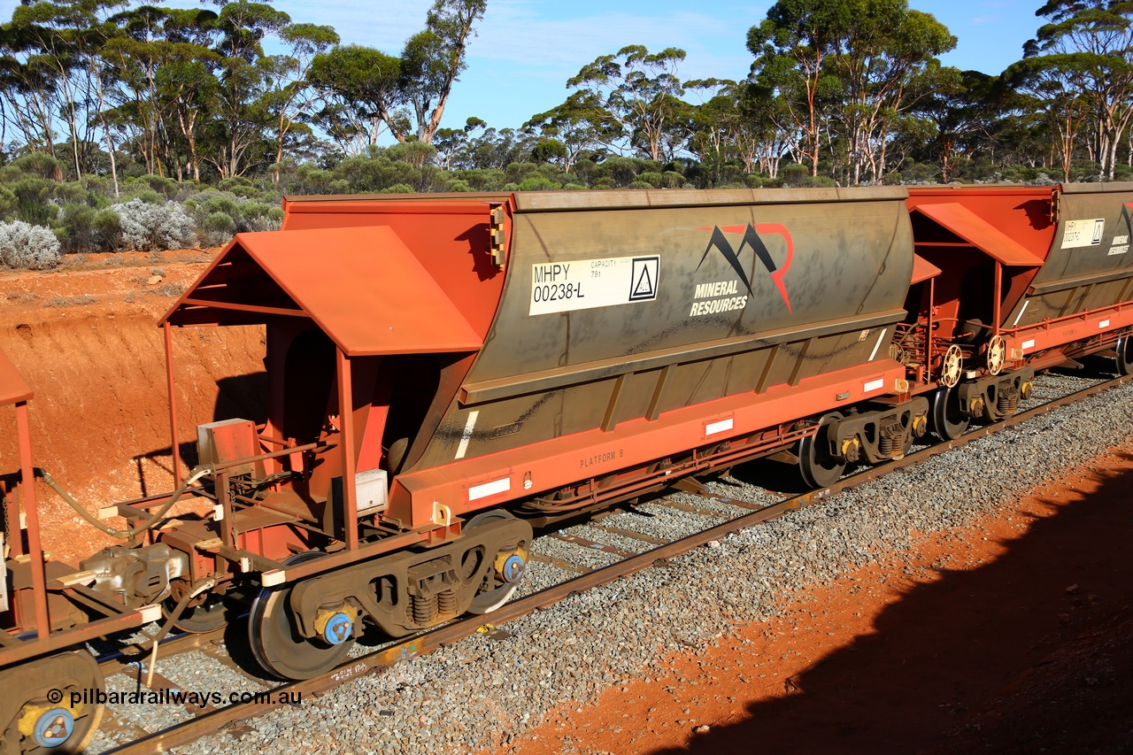 190109 1669
Binduli, Mineral Resources Ltd empty iron ore train 4030 with MRL's MHPY type iron ore waggon MHPY 00238 built by CSR Yangtze Co China serial 2014/382-238 in 2014 as a batch of 382 units, these bottom discharge hopper waggons are operated in 'married' pairs.
Keywords: MHPY-type;MHPY00238;2014/382-238;CSR-Yangtze-Rolling-Stock-Co-China;