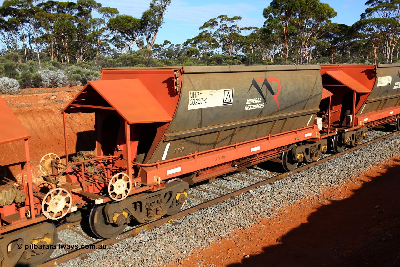190109 1670
Binduli, Mineral Resources Ltd empty iron ore train 4030 with MRL's MHPY type iron ore waggon MHPY 00237 built by CSR Yangtze Co China serial 2014/382-237 in 2014 as a batch of 382 units, these bottom discharge hopper waggons are operated in 'married' pairs.
Keywords: MHPY-type;MHPY00237;2014/382-237;CSR-Yangtze-Co-China;