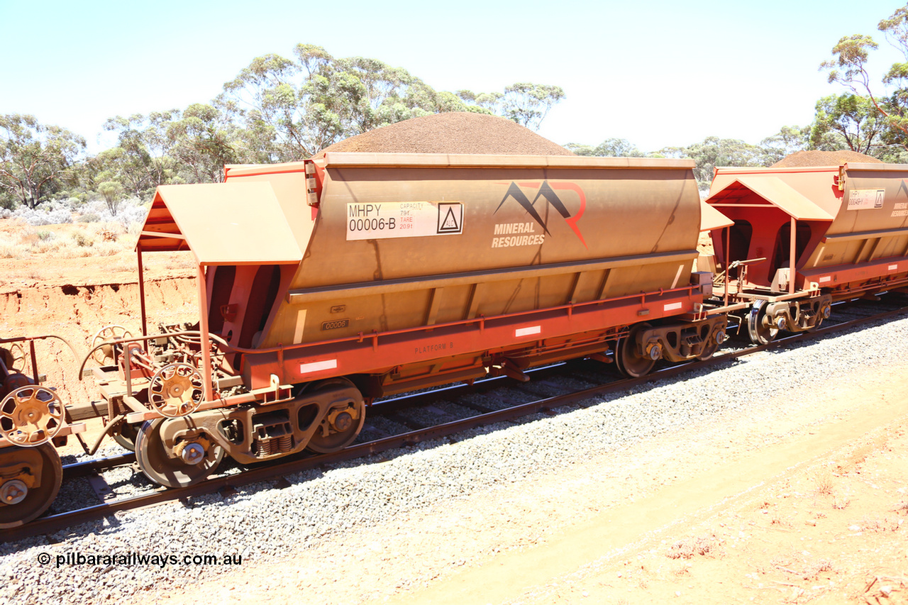 190129 4240
Binduli, on Mineral Resources Ltd loaded iron ore train service from Koolyanobbing to Esperance #3033 with MRL's MHPY type iron ore waggon MHPY 00006 built by CSR Yangtze Co China serial 2014/382-6 in 2014 as a batch of 382 units, these bottom discharge hopper waggons are operated in 'married' pairs.
Keywords: MHPY-type;MHPY00006;2014/382-6;CSR-Yangtze-Co-China;