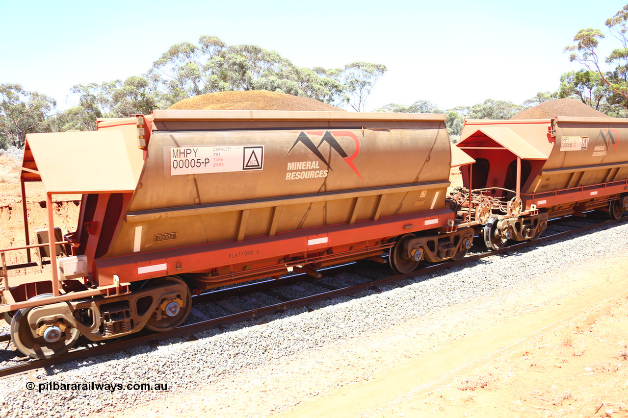 190129 4241
Binduli, on Mineral Resources Ltd loaded iron ore train service from Koolyanobbing to Esperance #3033 with MRL's MHPY type iron ore waggon MHPY 00005 built by CSR Yangtze Co China serial 2014/382-5 in 2014 as a batch of 382 units, these bottom discharge hopper waggons are operated in 'married' pairs.
Keywords: MHPY-type;MHPY00005;2014/382-5;CSR-Yangtze-Co-China;