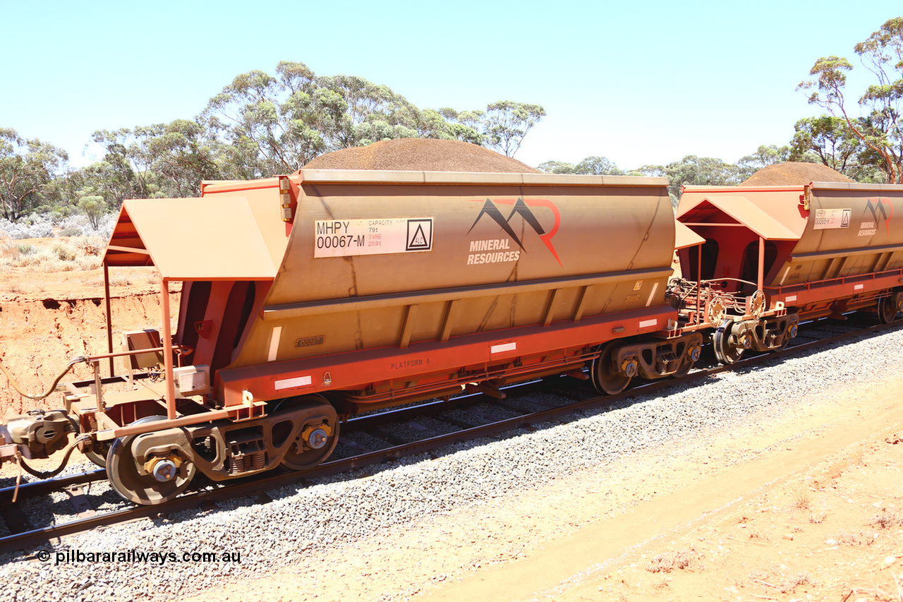 190129 4243
Binduli, on Mineral Resources Ltd loaded iron ore train service from Koolyanobbing to Esperance #3033 with MRL's MHPY type iron ore waggon MHPY 00067 built by CSR Yangtze Co China serial 2014/382-67 in 2014 as a batch of 382 units, these bottom discharge hopper waggons are operated in 'married' pairs.
Keywords: MHPY-type;MHPY00067;2014/382-67;CSR-Yangtze-Co-China;