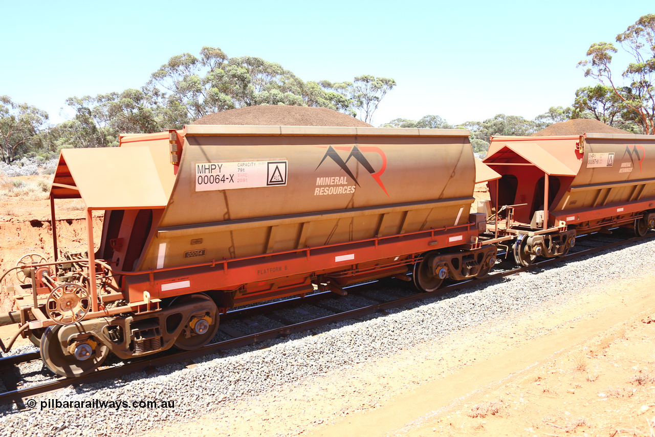 190129 4244
Binduli, on Mineral Resources Ltd loaded iron ore train service from Koolyanobbing to Esperance #3033 with MRL's MHPY type iron ore waggon MHPY 00064 built by CSR Yangtze Co China serial 2014/382-64 in 2014 as a batch of 382 units, these bottom discharge hopper waggons are operated in 'married' pairs.
Keywords: MHPY-type;MHPY00064;2014/382-64;CSR-Yangtze-Co-China;