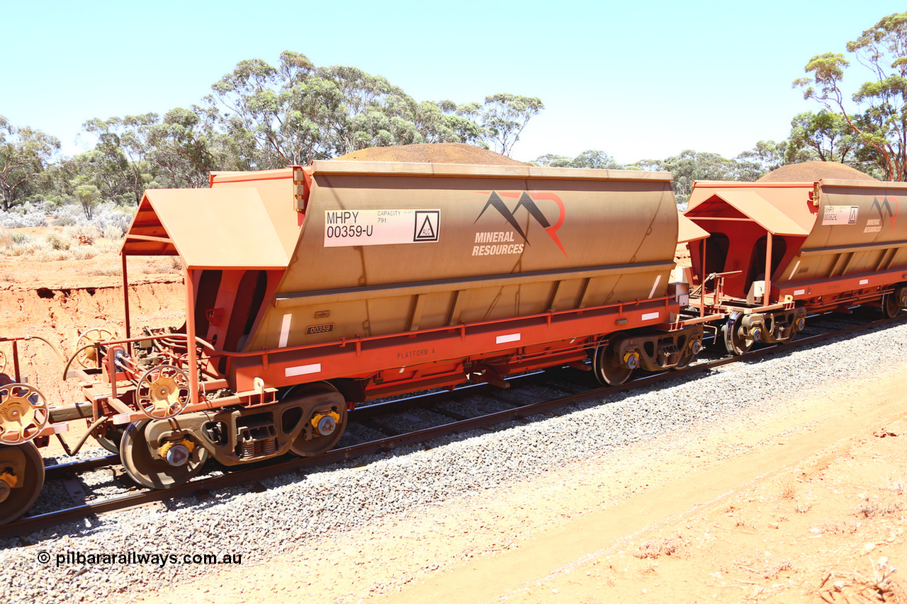 190129 4254
Binduli, on Mineral Resources Ltd loaded iron ore train service from Koolyanobbing to Esperance #3033 with MRL's MHPY type iron ore waggon MHPY 00359 built by CSR Yangtze Co China serial 2014/382-359 in 2014 as a batch of 382 units, these bottom discharge hopper waggons are operated in 'married' pairs.
Keywords: MHPY-type;MHPY00359;2014/382-359;CSR-Yangtze-Co-China;
