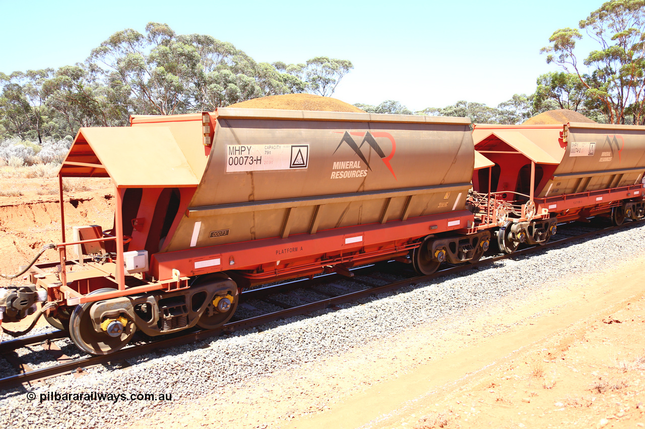 190129 4279
Binduli, on Mineral Resources Ltd loaded iron ore train service from Koolyanobbing to Esperance #3033 with MRL's MHPY type iron ore waggon MHPY 00073 built by CSR Yangtze Co China serial 2014/382-73 in 2014 as a batch of 382 units, these bottom discharge hopper waggons are operated in 'married' pairs.
Keywords: MHPY-type;MHPY00073;2014/382-73;CSR-Yangtze-Co-China;