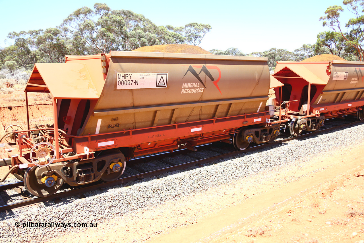 190129 4280
Binduli, on Mineral Resources Ltd loaded iron ore train service from Koolyanobbing to Esperance #3033 with MRL's MHPY type iron ore waggon MHPY 00097 built by CSR Yangtze Co China serial 2014/382-97 in 2014 as a batch of 382 units, these bottom discharge hopper waggons are operated in 'married' pairs.
Keywords: MHPY-type;MHPY00097;2014/382-97;CSR-Yangtze-Co-China;