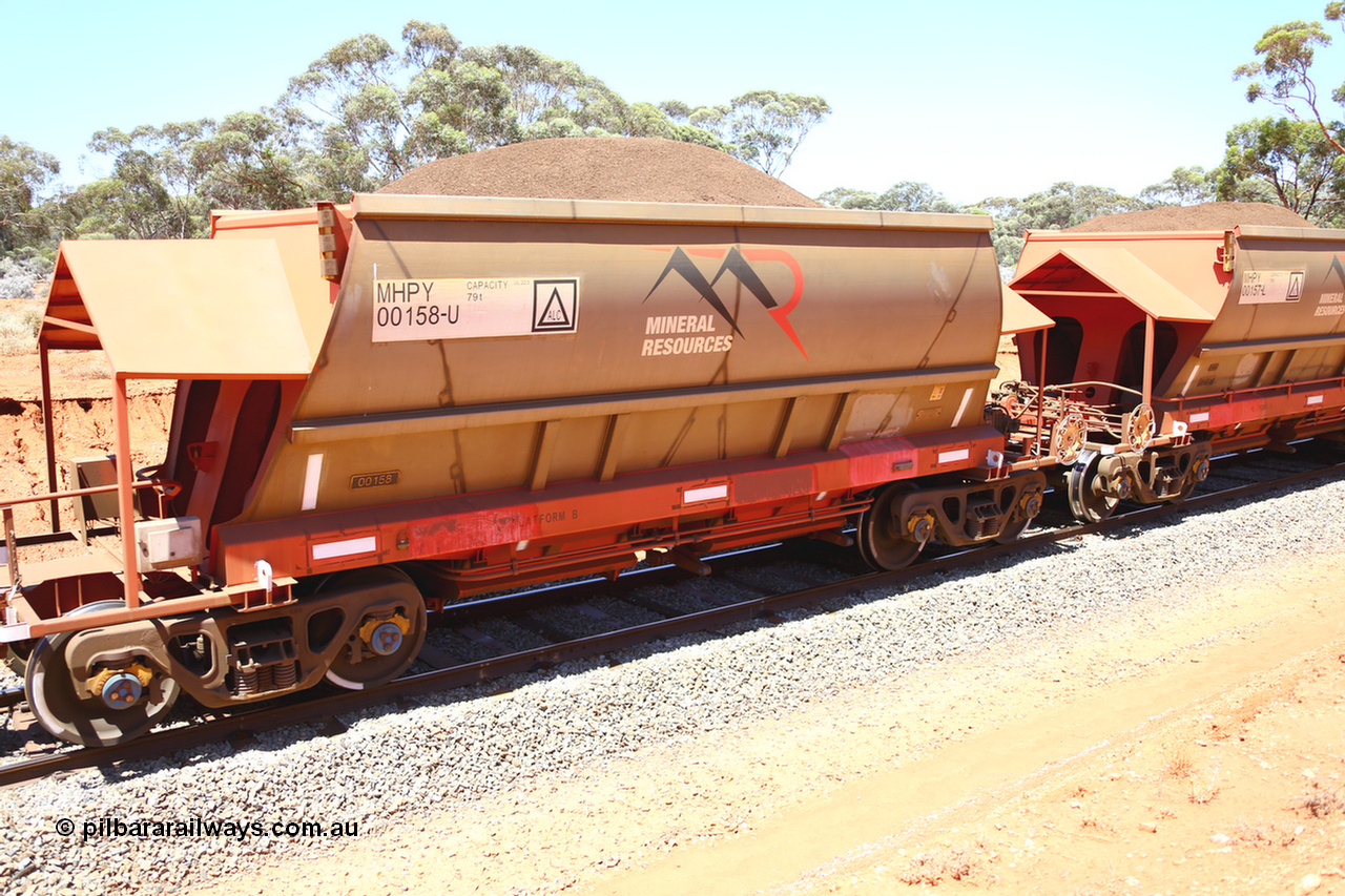190129 4285
Binduli, on Mineral Resources Ltd loaded iron ore train service from Koolyanobbing to Esperance #3033 with MRL's MHPY type iron ore waggon MHPY 00158 built by CSR Yangtze Co China serial 2014/382-158 in 2014 as a batch of 382 units, these bottom discharge hopper waggons are operated in 'married' pairs.
Keywords: MHPY-type;MHPY00158;2014/382-158;CSR-Yangtze-Co-China;