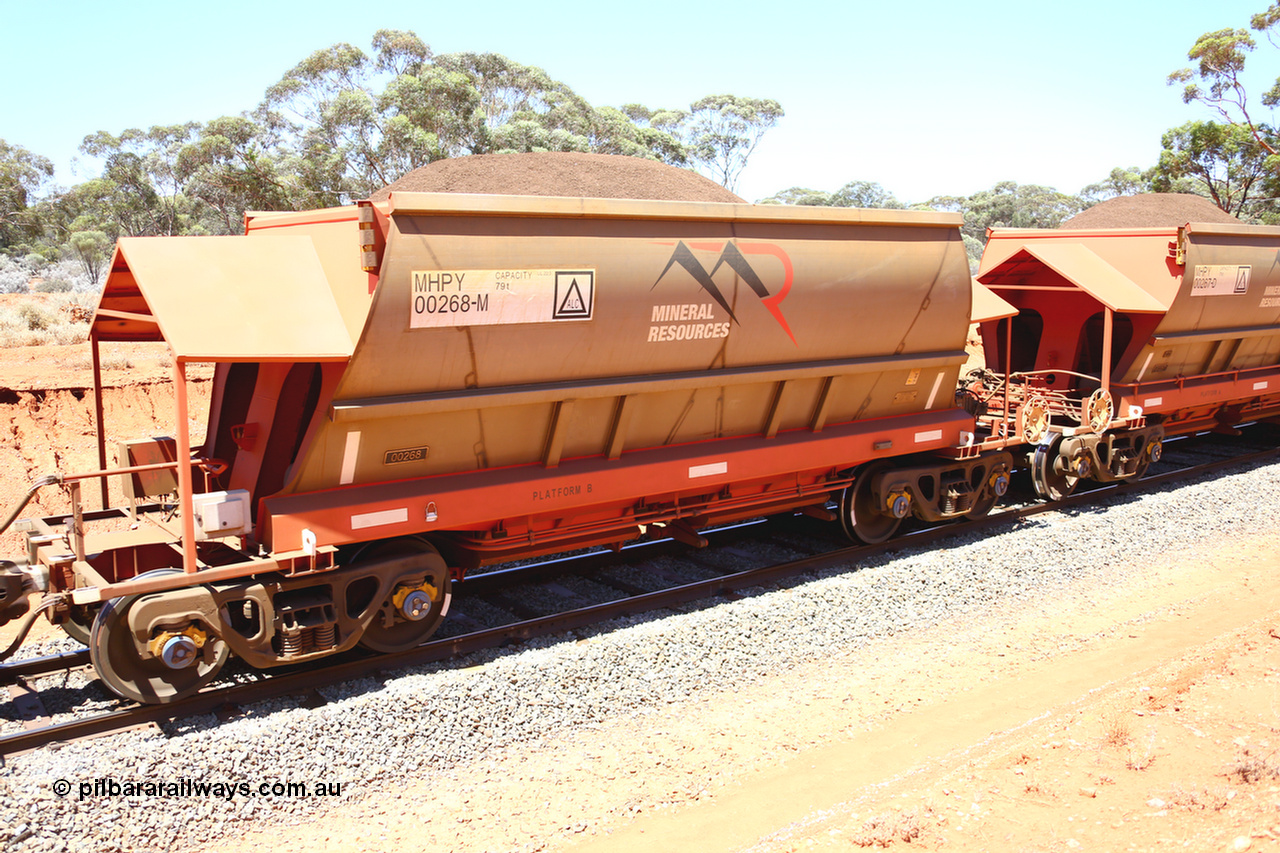 190129 4293
Binduli, on Mineral Resources Ltd loaded iron ore train service from Koolyanobbing to Esperance #3033 with MRL's MHPY type iron ore waggon MHPY 00268 built by CSR Yangtze Co China serial 2014/382-268 in 2014 as a batch of 382 units, these bottom discharge hopper waggons are operated in 'married' pairs.
Keywords: MHPY-type;MHPY00268;2014/382-268;CSR-Yangtze-Co-China;