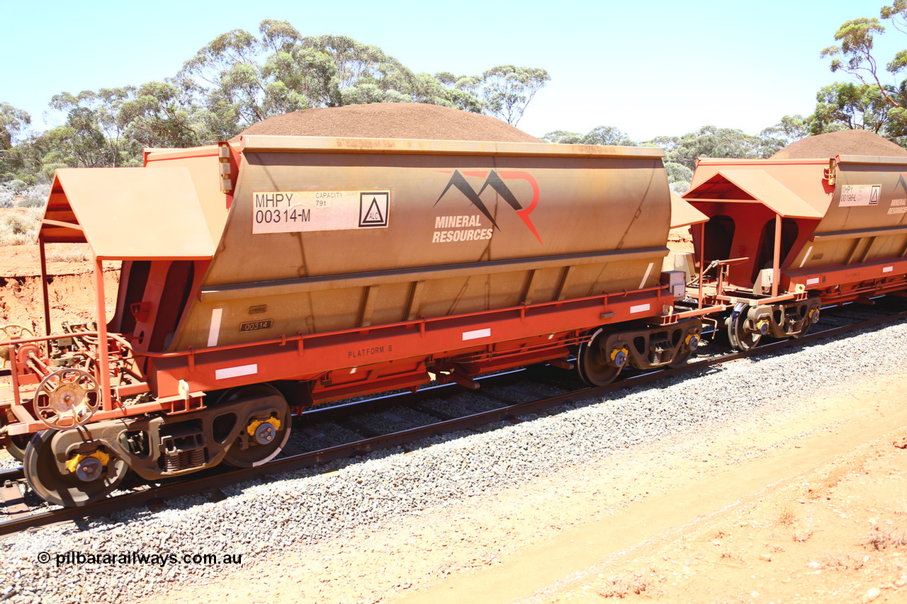 190129 4296
Binduli, on Mineral Resources Ltd loaded iron ore train service from Koolyanobbing to Esperance #3033 with MRL's MHPY type iron ore waggon MHPY 00314 built by CSR Yangtze Co China serial 2014/382-314 in 2014 as a batch of 382 units, these bottom discharge hopper waggons are operated in 'married' pairs.
Keywords: MHPY-type;MHPY00314;2014/382-314;CSR-Yangtze-Co-China;