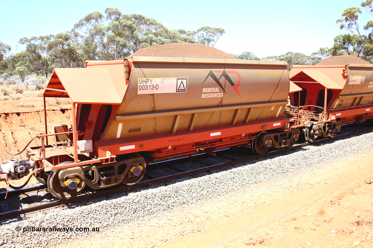 190129 4297
Binduli, on Mineral Resources Ltd loaded iron ore train service from Koolyanobbing to Esperance #3033 with MRL's MHPY type iron ore waggon MHPY 00313 built by CSR Yangtze Co China serial 2014/382-313 in 2014 as a batch of 382 units, these bottom discharge hopper waggons are operated in 'married' pairs.
Keywords: MHPY-type;MHPY00313;2014/382-313;CSR-Yangtze-Co-China;