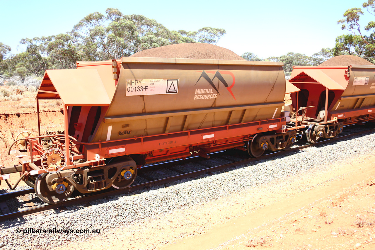 190129 4300
Binduli, on Mineral Resources Ltd loaded iron ore train service from Koolyanobbing to Esperance #3033 with MRL's MHPY type iron ore waggon MHPY 00133 built by CSR Yangtze Co China serial 2014/382-133 in 2014 as a batch of 382 units, these bottom discharge hopper waggons are operated in 'married' pairs.
Keywords: MHPY-type;MHPY00133;2014/382-133;CSR-Yangtze-Co-China;