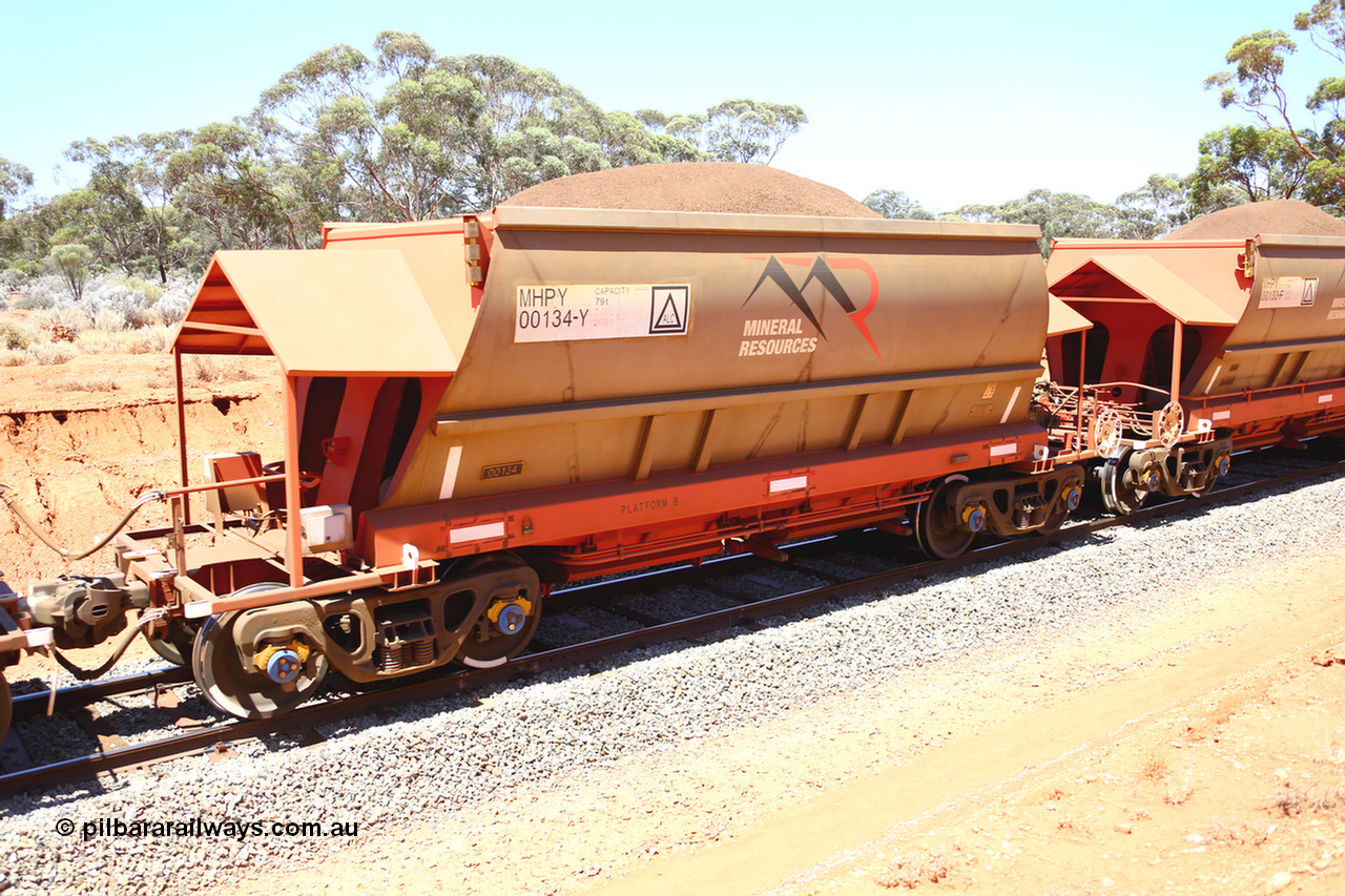 190129 4301
Binduli, on Mineral Resources Ltd loaded iron ore train service from Koolyanobbing to Esperance #3033 with MRL's MHPY type iron ore waggon MHPY 00134 built by CSR Yangtze Co China serial 2014/382-134 in 2014 as a batch of 382 units, these bottom discharge hopper waggons are operated in 'married' pairs.
Keywords: MHPY-type;MHPY00134;2014/382-134;CSR-Yangtze-Co-China;