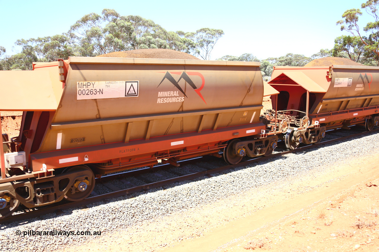 190129 4303
Binduli, on Mineral Resources Ltd loaded iron ore train service from Koolyanobbing to Esperance #3033 with MRL's MHPY type iron ore waggon MHPY 00263 built by CSR Yangtze Co China serial 2014/382-263 in 2014 as a batch of 382 units, these bottom discharge hopper waggons are operated in 'married' pairs.
Keywords: MHPY-type;MHPY00263;2014/382-263;CSR-Yangtze-Co-China;