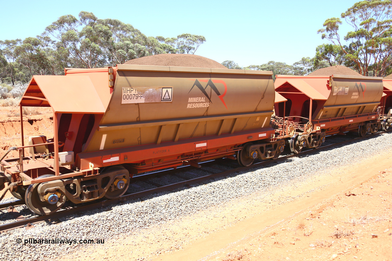 190129 4323
Binduli, on Mineral Resources Ltd loaded iron ore train service from Koolyanobbing to Esperance #3033 with MRL's MHPY type iron ore waggon MHPY 00079 built by CSR Yangtze Co China serial 2014/382-79 in 2014 as a batch of 382 units, these bottom discharge hopper waggons are operated in 'married' pairs.
Keywords: MHPY-type;MHPY00079;2014/382-79;CSR-Yangtze-Co-China;