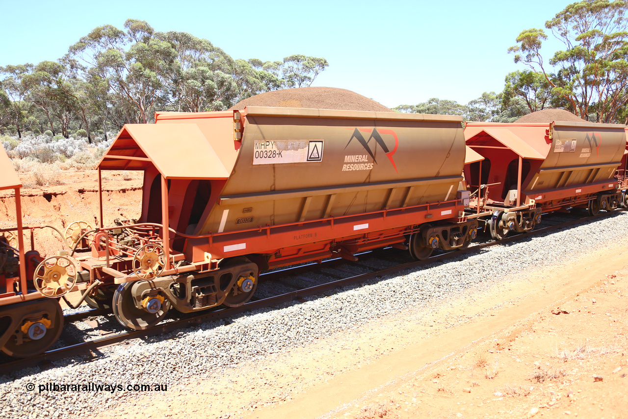 190129 4324
Binduli, on Mineral Resources Ltd loaded iron ore train service from Koolyanobbing to Esperance #3033 with MRL's MHPY type iron ore waggon MHPY 00328 built by CSR Yangtze Co China serial 2014/382-328 in 2014 as a batch of 382 units, these bottom discharge hopper waggons are operated in 'married' pairs.
Keywords: MHPY-type;MHPY00328;2014/382-328;CSR-Yangtze-Co-China;