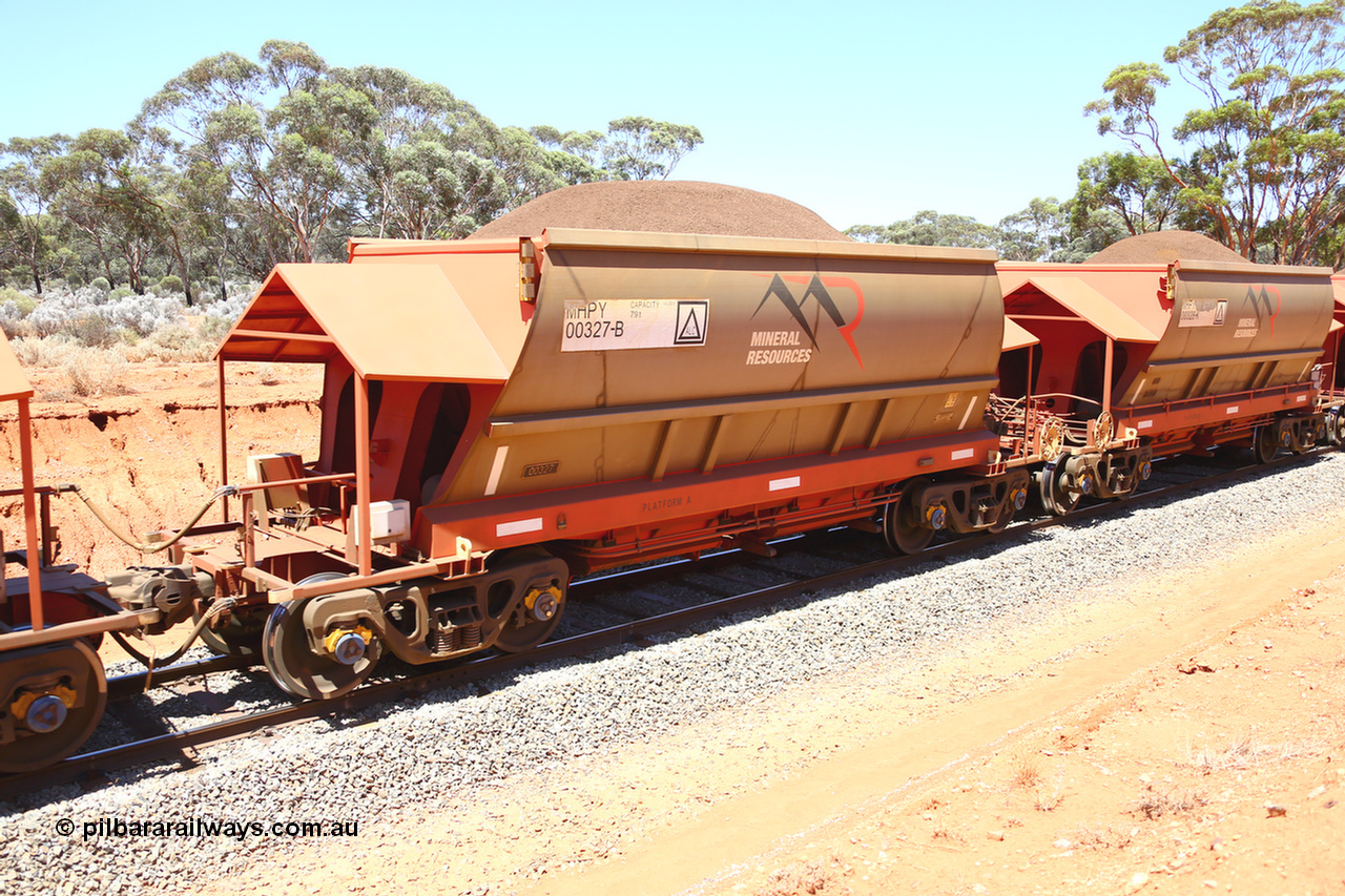 190129 4325
Binduli, on Mineral Resources Ltd loaded iron ore train service from Koolyanobbing to Esperance #3033 with MRL's MHPY type iron ore waggon MHPY 00327 built by CSR Yangtze Co China serial 2014/382-327 in 2014 as a batch of 382 units, these bottom discharge hopper waggons are operated in 'married' pairs.
Keywords: MHPY-type;MHPY00327;2014/382-327;CSR-Yangtze-Co-China;