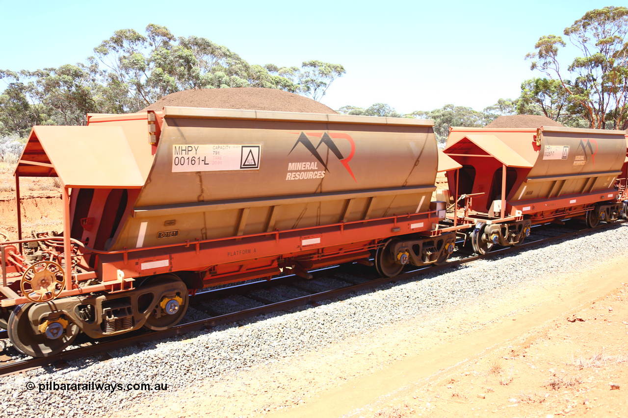 190129 4338
Binduli, on Mineral Resources Ltd loaded iron ore train service from Koolyanobbing to Esperance #3033 with MRL's MHPY type iron ore waggon MHPY 00161 built by CSR Yangtze Co China serial 2014/382-161 in 2014 as a batch of 382 units, these bottom discharge hopper waggons are operated in 'married' pairs.
Keywords: MHPY-type;MHPY00161;2014/382-161;CSR-Yangtze-Co-China;