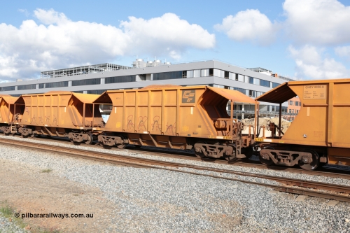 140601 4628
Midland, loaded iron ore train #1030 heading to Kwinana, CFCLA leased CHEY type waggon CHEY 8013 one pair of 120 bar coupled pairs built by Bluebird Rail Operations SA in 2011-12. June 1, 2014.
Keywords: CHEY-type;CHEY8013;Bluebird-Rail-Operations-SA;2011/120-13;