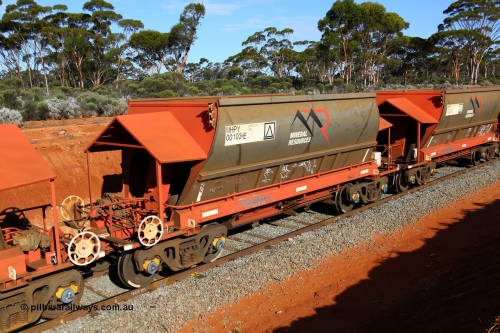 190109 1596
Binduli, Mineral Resources Ltd empty iron ore train 4030 with MRL's MHPY type iron ore waggon MHPY 00103 built by CSR Yangtze Co China serial 2014/382-103 in 2014 as a batch of 382 units, these bottom discharge hopper waggons are operated in 'married' pairs.
Keywords: MHPY-type;MHPY00103;2014/382-103;CSR-Yangtze-Rolling-Stock-Co-China;