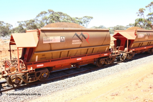 190129 4242
Binduli, on Mineral Resources Ltd loaded iron ore train service from Koolyanobbing to Esperance #3033 with MRL's MHPY type iron ore waggon MHPY 00068 built by CSR Yangtze Co China serial 2014/382-68 in 2014 as a batch of 382 units, these bottom discharge hopper waggons are operated in 'married' pairs.
Keywords: MHPY-type;MHPY00068;2014/382-68;CSR-Yangtze-Co-China;