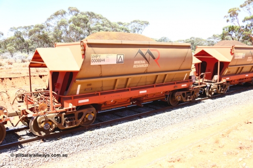 190129 4270
Binduli, on Mineral Resources Ltd loaded iron ore train service from Koolyanobbing to Esperance #3033 with MRL's MHPY type iron ore waggon MHPY 00069 built by CSR Yangtze Co China serial 2014/382-69 in 2014 as a batch of 382 units, these bottom discharge hopper waggons are operated in 'married' pairs.
Keywords: MHPY-type;MHPY00069;2014/382-69;CSR-Yangtze-Co-China;