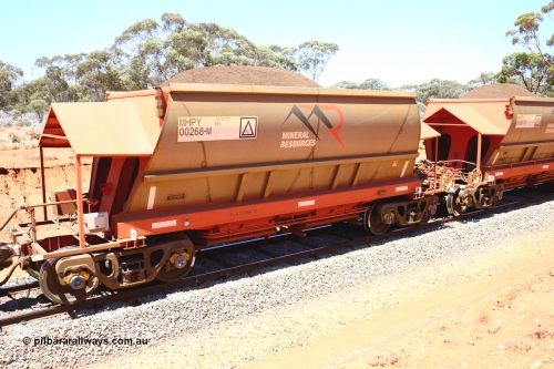190129 4293
Binduli, on Mineral Resources Ltd loaded iron ore train service from Koolyanobbing to Esperance #3033 with MRL's MHPY type iron ore waggon MHPY 00268 built by CSR Yangtze Co China serial 2014/382-268 in 2014 as a batch of 382 units, these bottom discharge hopper waggons are operated in 'married' pairs.
Keywords: MHPY-type;MHPY00268;2014/382-268;CSR-Yangtze-Co-China;