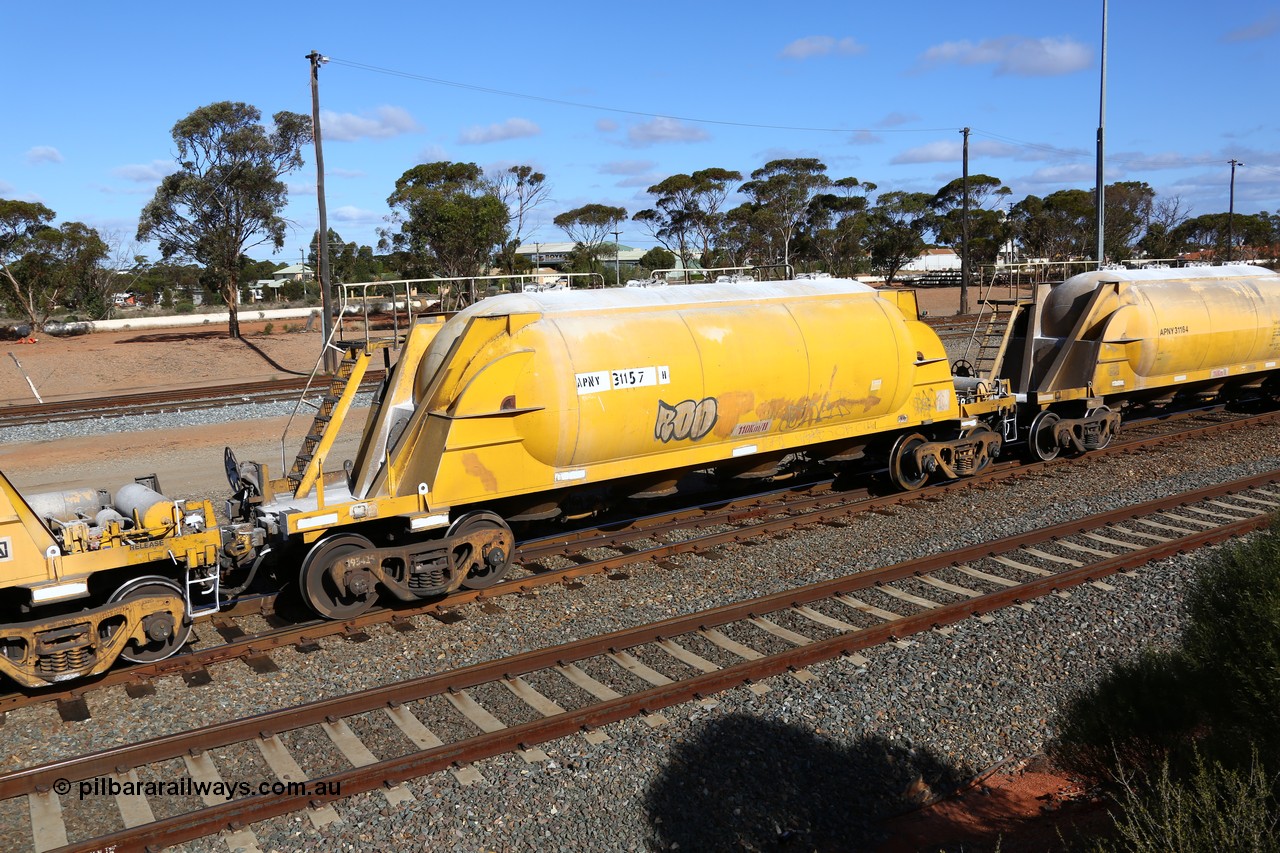 160522 2463
West Kalgoorlie, APNY 31157, one of twelve built by WAGR Midland Workshops in 1974 as WNA type pneumatic discharge nickel concentrate waggon, WAGR built and owned copies of the AE Goodwin built WN waggons for WMC.
Keywords: APNY-type;APNY31157;WAGR-Midland-WS;WNA-type;