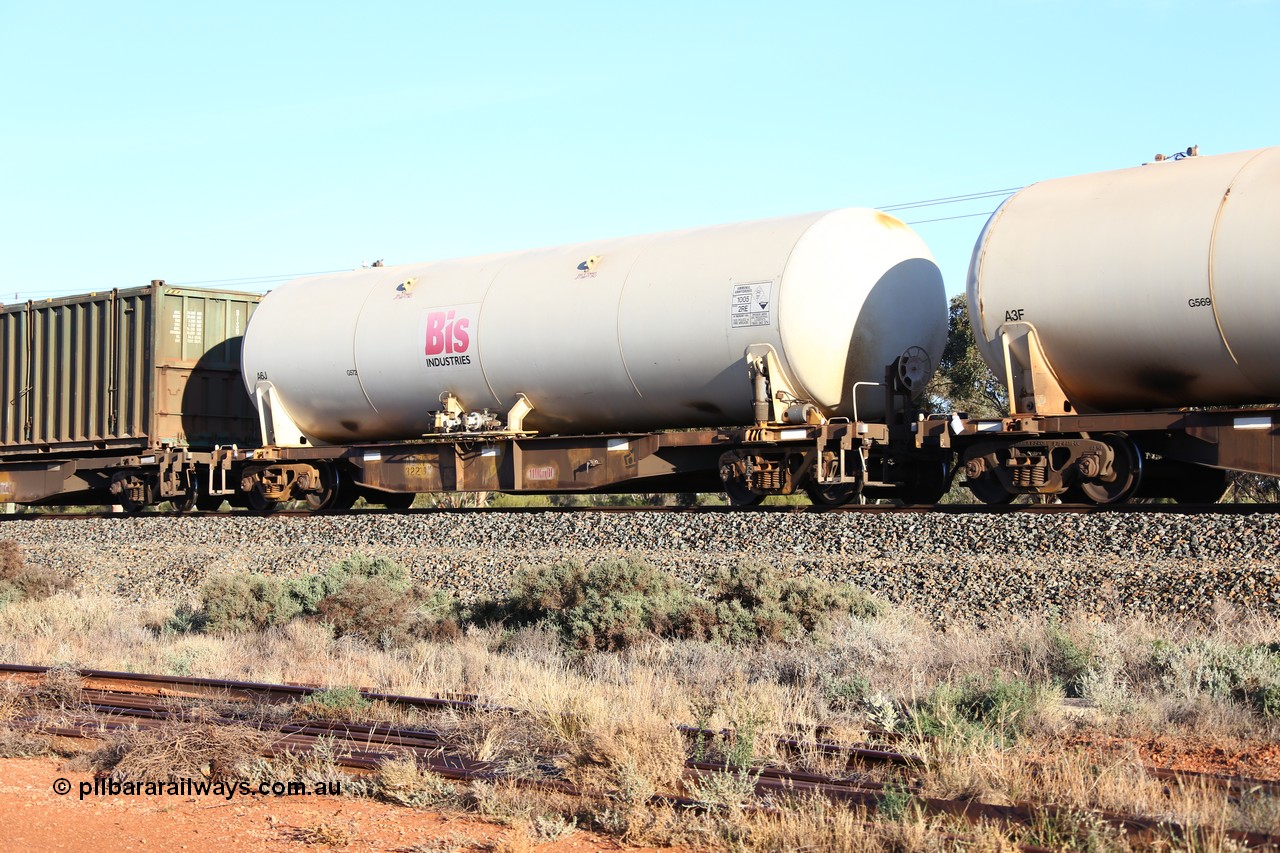 160523 2746
West Kalgoorlie, Malcolm freighter, train no. 1029, AZKY type anhydrous ammonia tank waggon AZKY 32239, one of twelve built by Goninan WA in 1998 as type WQK for Murrin Murrin traffic, fitted with Bis Industries anhydrous ammonia tank A6J.
Keywords: AZKY-type;AZKY32239;Goninan-WA;WQK-type;