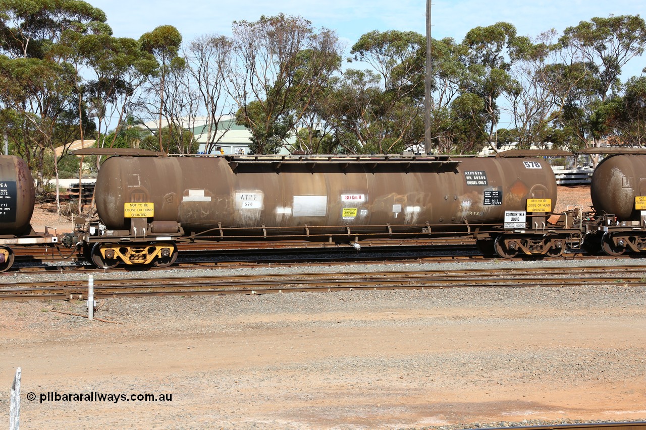 160523 3288
West Kalgoorlie, ATPF 578 fuel tank waggon, originally built by WAGR Midland Workshops in 1974 for Shell as type WJP, it also spent time in SA in 1985, 80.66 kL one compartment one dome, capacity of 80350 litres, fitted with type F InterLock couplers.
Keywords: ATPF-type;ATPF578;WAGR-Midland-WS;WJP-type;