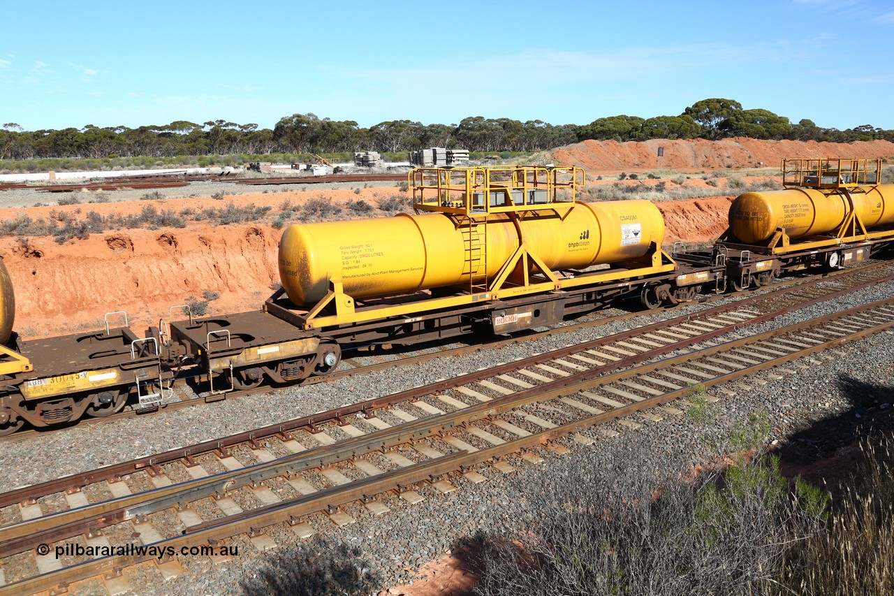 160523 3337
West Kalgoorlie, AQHY 30071 with CSA 0081, originally built by the WAGR Midland Workshops in 1964/66 as a WF type flat waggon, then in 1997, following several recodes and modifications, was one of seventy five waggons converted to the WQH to carry CSA sulphuric acid tanks between Hampton/Kalgoorlie and Perth. CSA 0081 is one of twelve units built by Acid Plant Management Services, WA in 2015.
Keywords: AQHY-type;AQHY30071;WAGR-Midland-WS;WF-type;WFDY-type;WFDF-type;RFDF-type;WQH-type;