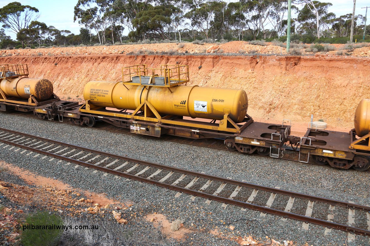 160525 4810
West Kalgoorlie, AQHY 30006 with sulphuric acid tank CSA 0131, originally built by WAGR Midland Workshops in 1964/66 as a WF type flat waggon, then in 1997, following several recodes and modifications, was one of seventy five waggons converted to the WQH type to carry CSA sulphuric acid tanks between Hampton/Kalgoorlie and Perth/Kwinana, part of empty acid train 4405 departing in the yard. CSA 0131 was built by Vcare Engineering, India for Access Petrotec & Mining Solutions in 2015.
Keywords: AQHY-type;AQHY30006;WAGR-Midland-WS;WF-type;WMA-type;WFDY-type;WFDF-type;RFDF-type;WQH-type;