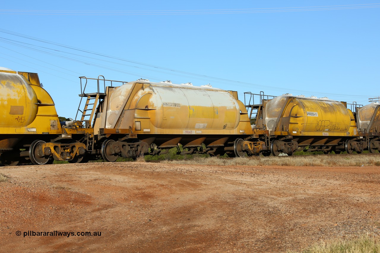 160527 5482
Parkeston, loaded lime and cement shunt train 2C71 from West Kalgoorlie to Parkeston for Cockburn Lime. APNY 31152, one of twelve built by WAGR Midland Workshops in 1974 as WNA type pneumatic discharge nickel concentrate waggon, WAGR built and owned copies of the AE Goodwin built WN waggons for WMC.
Keywords: APNY-type;APNY31152;WAGR-Midland-WS;WNA-type;