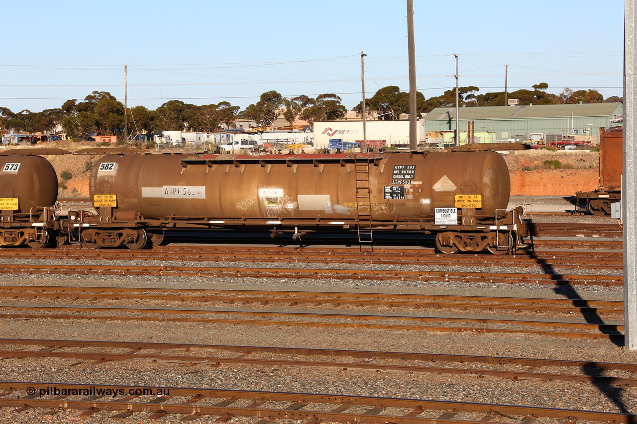 160601 10073
West Kalgoorlie, APTF type diesel fuel tanker ATPF 582, Shell Fleet No. 694, built by WAGR Midland Workshops in 1976 for Shell. Converted to narrow gauge 1986 and recoded JPC. Capacity now 80,500 litres.
Keywords: ATPF-type;ATPF582;WAGR-Midland-WS;WJP-type;JPC-type;