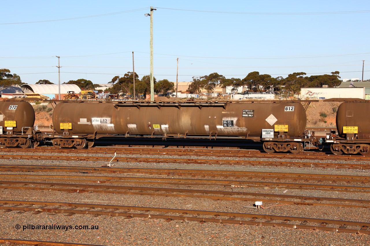 160601 10075
West Kalgoorlie, ATQF 612 diesel fuel tanker, Shell Fleet No. TR721, one of two such waggons built by Indeng Qld in 1982 for Shell as type WJQ with an original capacity of 79000 litres, current diesel capacity of 72000 litres, fitted with type F InterLock couplers.
Keywords: ATQF-type;ATQF612;Indeng-Qld;WJQ-type;