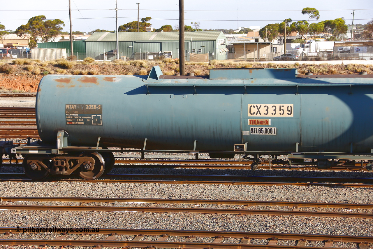 190108 1280
West Kalgoorlie, NTAY type fuel tank waggon NTAY 3359 with 65,000 litre capacity for Caltex. Refurbished by Gemco WA in Nov 2013 from a Caltex NTAF type tank waggon NTAF 359 originally built by Comeng NSW in 1975 as a CTX type CTX 359. Shows A end.
Keywords: NTAY-type;NTAY3359;Comeng-NSW;CTX-type;CTX359;NTAF-type;