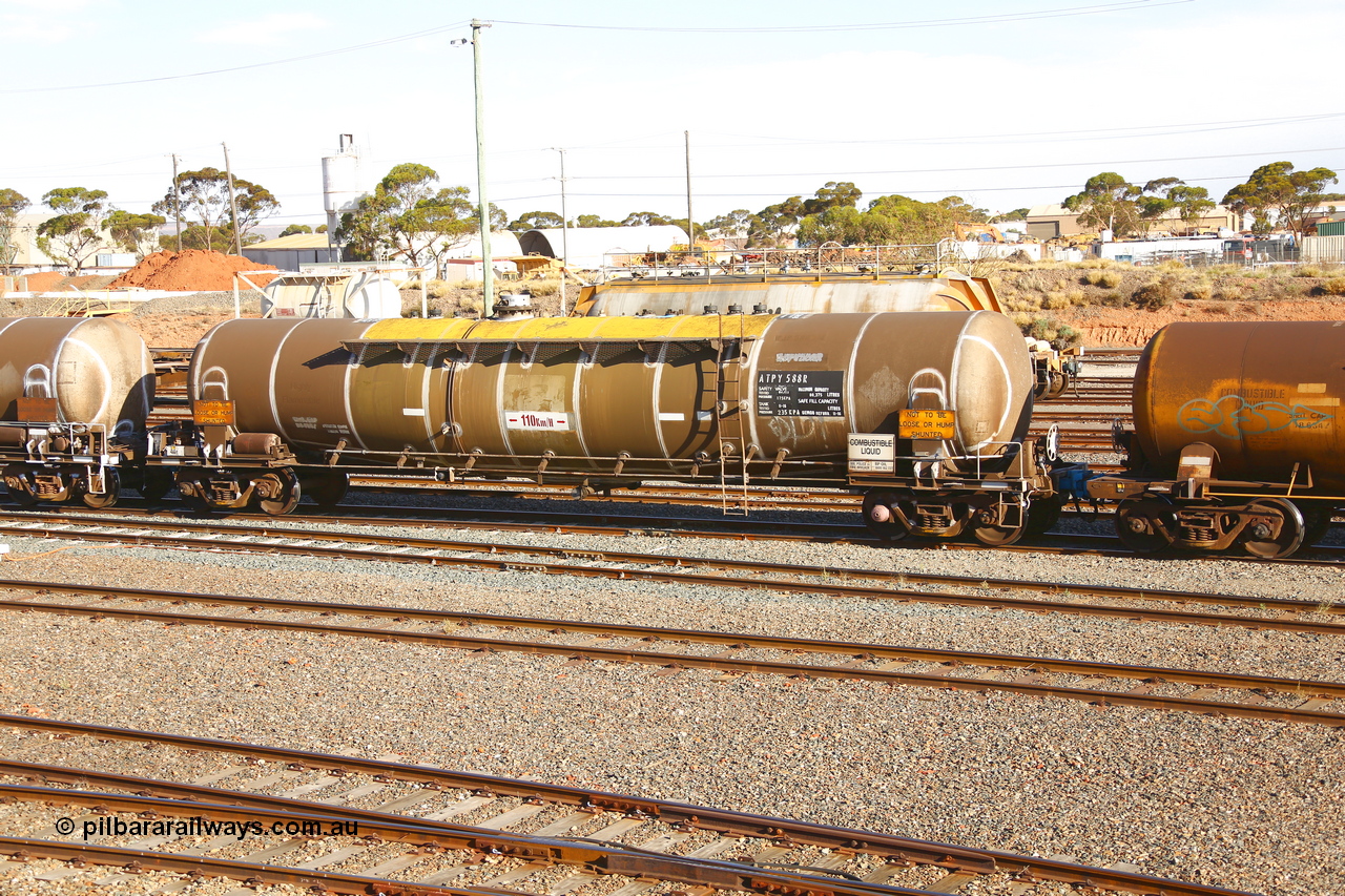 190108 1303
West Kalgoorlie, ATPY 588 fuel tank waggon, built by Westrail Midland Workshops in 1979 for Mobil as WJP type 80,000 litre single compartment and dome, recoded to WJPY, sold to BP Oil in 1985. Gemco WA refurbished November 2016, and now a 80,375 litre maximum capacity.
Keywords: ATPY-type;ATPY588;WAGR-Midland-WS;WJP-type;WJPY-type;