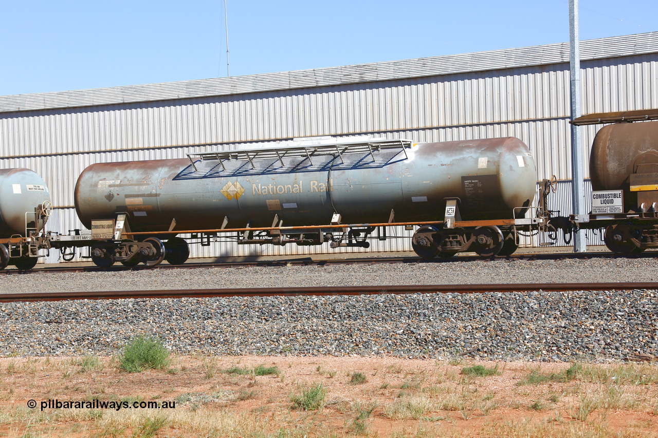 190109 1453
West Kalgoorlie, RHTY type tank waggon RHTY 664, one of fourteen such waggons built by Industrial Engineering Qld in 1976 for Victorian Railways as TWX type crude benzene tank 56,000 litres. Recoded to VTHX in 1979. After a period of storage ended up in National Rail ownership for Alice Springs traffic, now Pacific National ownership.
Keywords: RHTY-type;RHTY664;Indeng-Qld;TWX-type;VTHX-type;