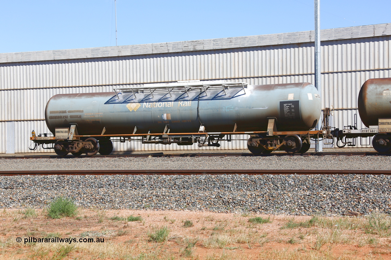 190109 1454
West Kalgoorlie, RHTY type tank waggon RHTY 653, one of fourteen such waggons built by Industrial Engineering Qld in 1976 for Victorian Railways as TWX type crude benzene tank 56,000 litres. Recoded to VTHX in 1979. After a period of storage ended up in National Rail ownership for Alice Springs traffic, now Pacific National ownership.
Keywords: RHTY-type;RHTY653;Indeng-Qld;TWX-type;VTHX-type;