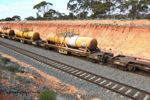 160525 4802
West Kalgoorlie, AQHY 30039 with sulphuric acid tank CSA 0110, originally built by WAGR Midland Workshops in 1964/66 as a WF type flat waggon, then in 1997, following several recodes and modifications, was one of seventy five waggons converted to the WQH type to carry CSA sulphuric acid tanks between Hampton/Kalgoorlie and Perth/Kwinana, part of empty acid train 4405 departing in the yard. CSA 0110 was built by VCare Engineering, India for Access Petrotec & Mining Solutions in 2015.
Keywords: AQHY-type;AQHY30039;WAGR-Midland-WS;WF-type;WFDY-type;WFDF-type;RFDF-type;WQH-type;