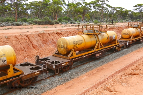 190109 1411
Binduli, AQHY 30088 with CSA 0126, originally built by the WAGR Midland Workshops in 1964/66 as a WF type flat waggon, then in 1997, following several recodes and modifications, was one of seventy five waggons converted to the WQH type to carry CSA sulphuric acid tanks between Hampton/Kalgoorlie and Perth/Kwinana. CSA 0126 was built by VCare Engineering, India for Access Petrotec & Mining Solutions.
Keywords: AQHY-type;AQHY30088;WAGR-Midland-WS;WF-type;WFDY-type;WFDF-type;RFDF-type;WQH-type;