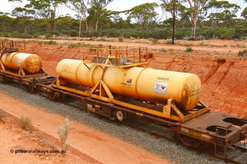 190109 1425
Binduli, AQHY 30076 with CSA 0076, originally built by the WAGR Midland Workshops in 1964/66 as a WF type flat waggon, then in 1997, following several recodes and modifications, was one of seventy five waggons converted to the WQH type to carry CSA sulphuric acid tanks between Hampton/Kalgoorlie and Perth/Kwinana. CSA 0076 was built by Acid Plant Management Services, WA.
Keywords: AQHY-type;AQHY30076;WAGR-Midland-WS;WF-type;WFDY-type;WFDF-type;WQH-type;