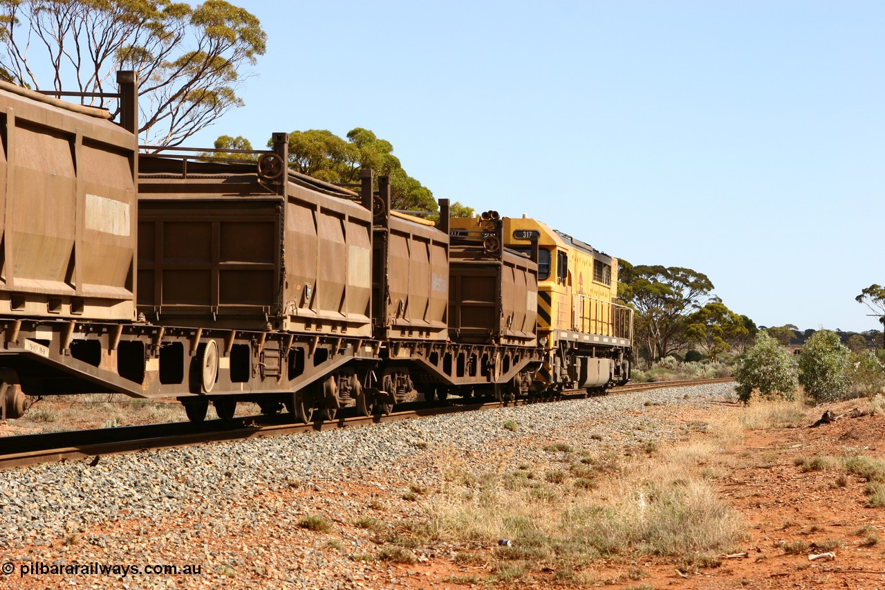 060117 2711
Bardoc, Q 317 leads the loaded Malcolm freighter train 2029, AQCY type container waggon with nickel residue container COR 5727. The AQCY type waggons were built by WAGR Midland Workshops as WFX type between 1969 and 1974.
Keywords: AQCY-type;WAGR-Midland-WS;WFX-type;WQCX-type;WAGR-Midland-WS;