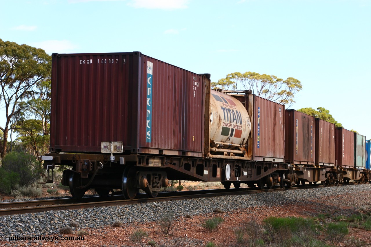 060117 2719
Bardoc, AQCY 30230 container waggon, originally built by WAGR Midland Workshops in 1974 as WFX type, recoded to WQCX in 1980, with three 20' containers, Royal Wolf box, a Titan tanktainer and a Cronos box.
Keywords: AQCY-type;AQCY30230;WAGR-Midland-WS;WFX-type;WQCX-type;