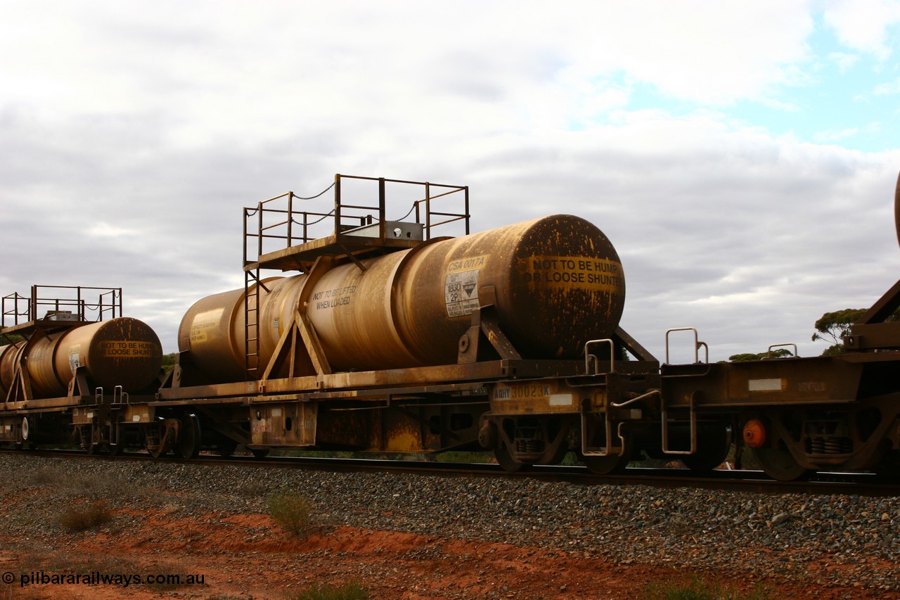 060527 4090
Scotia, AQHY 30023 with sulphuric acid tank CSA 0017, originally built by the WAGR Midland Workshops in 1964/66 as a WF type flat waggon, then in 1997, following several recodes and modifications, was one of seventy five waggons converted to the WQH type to carry CSA sulphuric acid tanks between Hampton/Kalgoorlie and Perth/Kwinana.
Keywords: AQHY-type;AQHY30023;WAGR-Midland-WS;WF-type;WFDY-type;WFDF-type;RFDF-type;WQH-type;