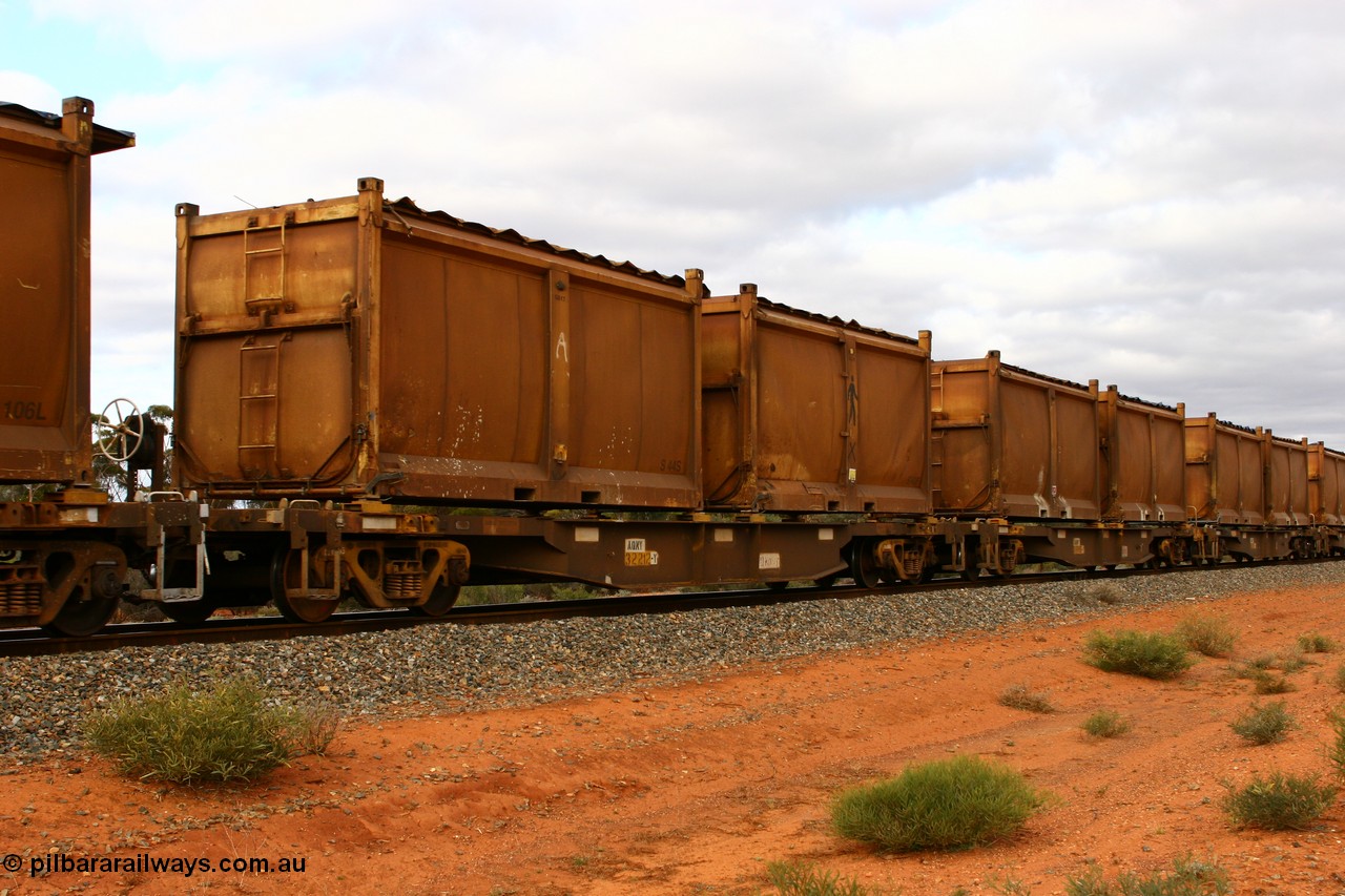 060527 4103
Scotia, AQNY 32212, final member of sixty two waggons built by Goninan WA in 1998 as WQN type for Murrin Murrin container traffic, with sulphur skips S44S and S40F both with original style doors and sliding tarpaulins, train 6029 loaded Malcolm freighter.
Keywords: AQNY-type;AQNY32212;Goninan-WA;WQN-type;