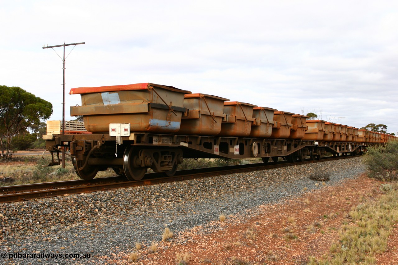 060527 4138
Scotia, AQCY 30233 flat waggon, one of forty five waggons built by WAGR Midland Workshops in 1974 as WFX type, recoded in 1981 to WQCX. Here carrying six loaded nickel ore kibbles and the end of train marker.
Keywords: AQCY-type;AQCY30233;WAGR-Midland-WS;WFX-type;WQCX-type;