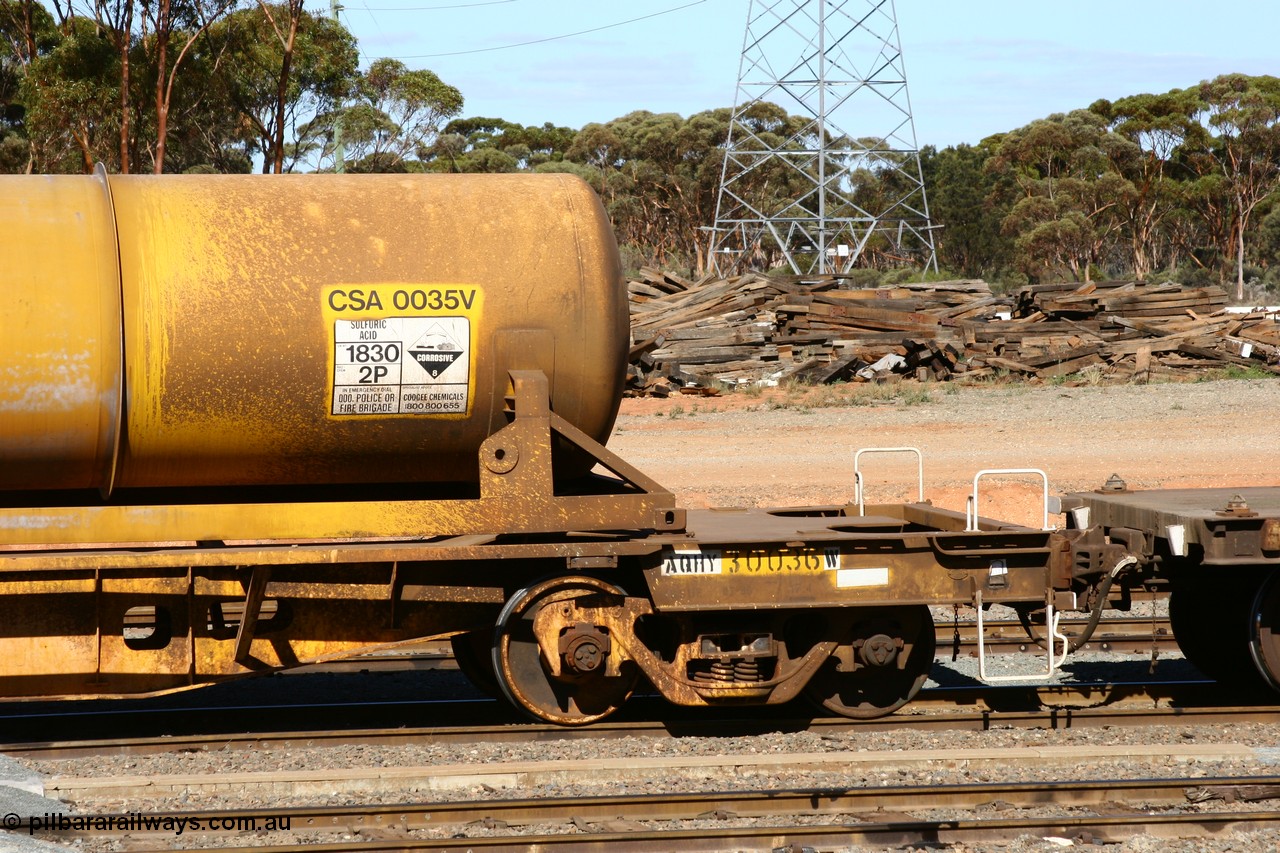 060528 4422
West Kalgoorlie, AQHY 30036 with sulphuric acid tank CSA 0035, originally built by the WAGR Midland Workshops in 1964/66 as a WF type flat waggon, then in 1997, following several recodes and modifications, was one of seventy five waggons converted to the WQH type to carry CSA sulphuric acid tanks between Hampton/Kalgoorlie and Perth/Kwinana.
Keywords: AQHY-type;AQHY30036;WAGR-Midland-WS;WF-type;WFP-type;WFDY-type;WFDF-type;RFDF-type;WQH-type;