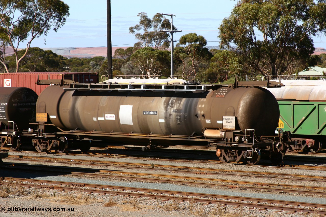 060528 4500 WJPB15493L
West Kalgoorlie, ATBY 14593 fuel tanker, one of nine JPB type tankers built for Bain Leasing Pty Ltd by Westrail Midland Workshops in 1981/82 for narrow gauge recoded to JPBA, converted to standard gauge as WJPB. 82000 litre capacity, with a 75000 SF limit.
Keywords: ATBY-type;ATBY14593;Westrail-Midland-WS;JPB-type;WJPB-type;