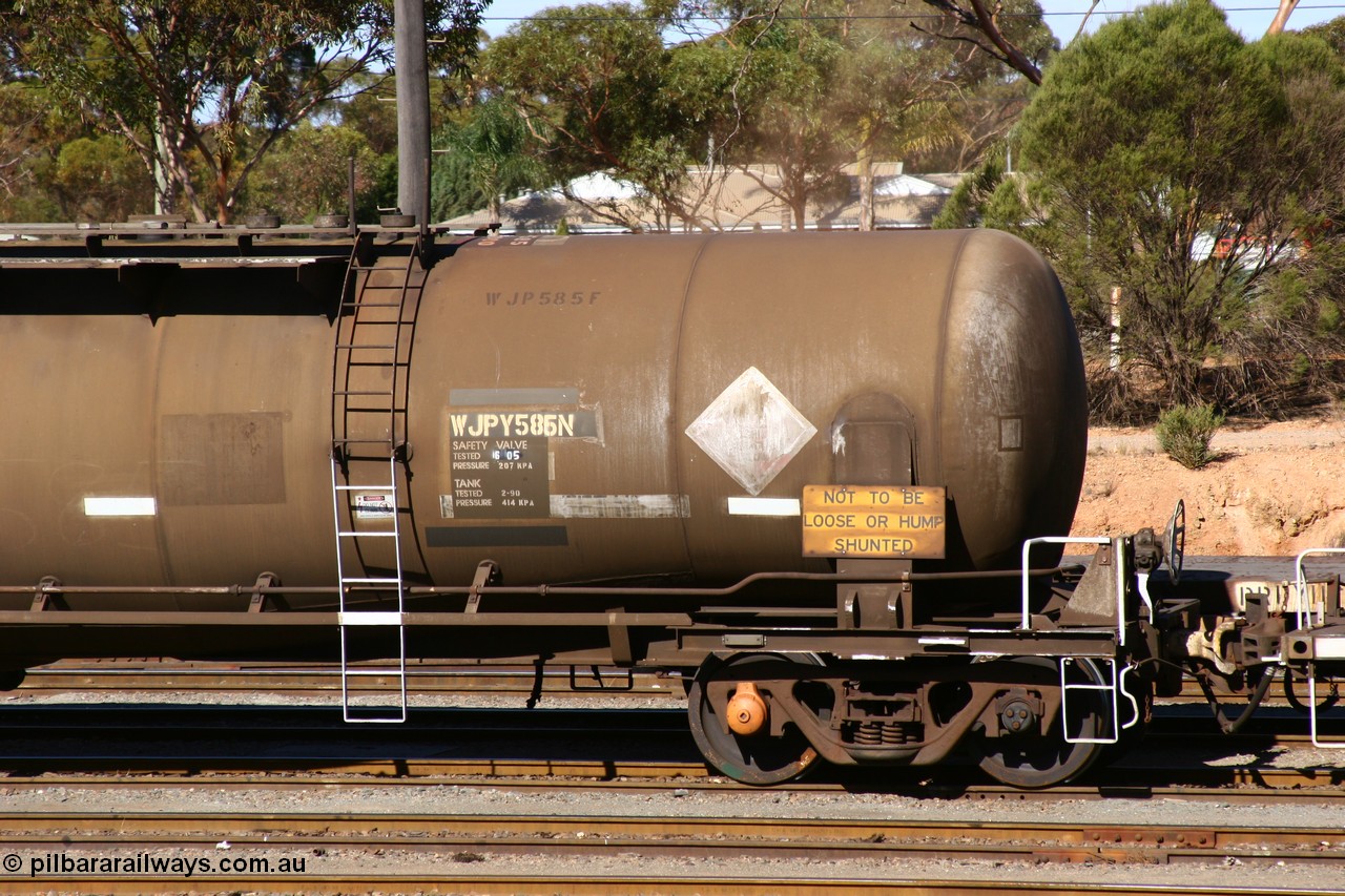 060528 4516
West Kalgoorlie, WJPY 585 fuel tank waggon built by WAGR Midland Workshops in 1976 with 586 for Mobil and coded WJP type, sold to BP Oil in 1985, 80,000 litres one compartment one dome.
Keywords: WJPY-type;WJPY585;WAGR-Midland-WS;WJP-type;