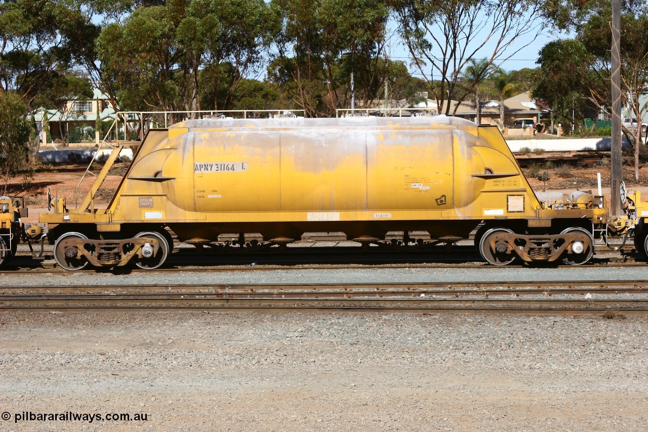 060528 4523
West Kalgoorlie, APNY 31164, one of four built by Westrail Midland Workshops in 1978 as WNA type pneumatic discharge nickel concentrate waggon, WAGR built and owned copies of the AE Goodwin built WN waggons for WMC.
Keywords: APNY-type;APNY31164;Westrail-Midland-WS;WNA-type;